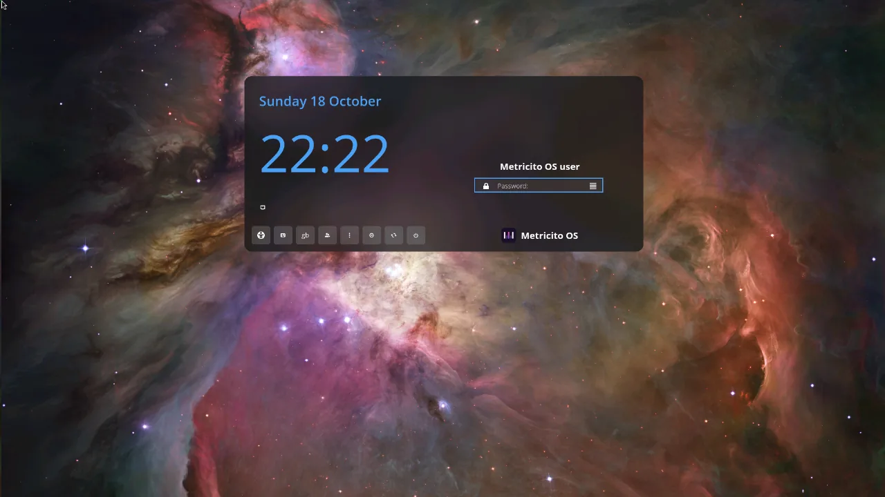 The login screen: clock and date on the left, the user and password box on the right, and the Metricito OS logo under it